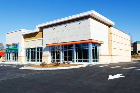 Commercial building washing in manassas removing fleet exhaust and traffic film